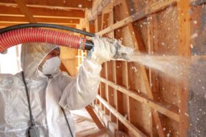 cellulose insulation installer, insulating home's walls.