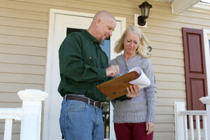 Contractor going over details of home inspection.